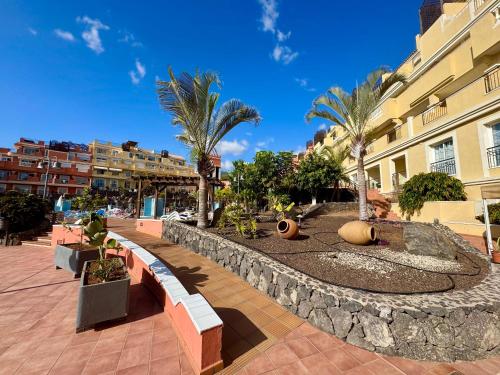 Prime Las Americas Getaway - Apartment with Huge Private Terrace & Pool Access