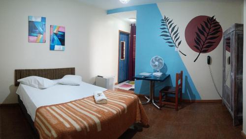 Ένα ή περισσότερα κρεβάτια σε δωμάτιο στο Hotel Pousada Icaraí