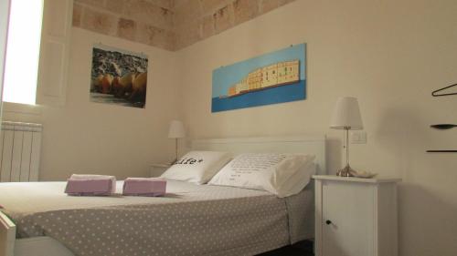 Кровать или кровати в номере Casa del Borgo