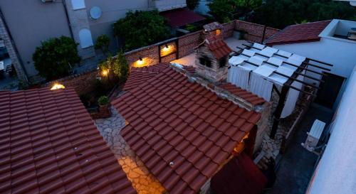 an overhead view of a house with a red roof at Apartment Grguric Apartments in Palit