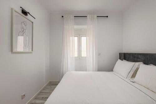 Ένα ή περισσότερα κρεβάτια σε δωμάτιο στο Amadora Flat 6