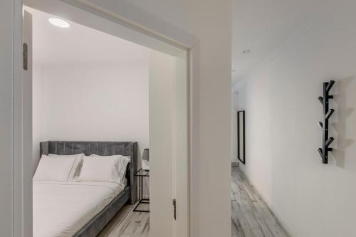 Ένα ή περισσότερα κρεβάτια σε δωμάτιο στο Amadora Flat 6