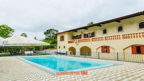 Kolam renang di atau dekat dengan Chacara em Suzano com Piscina e Vista Incrivel