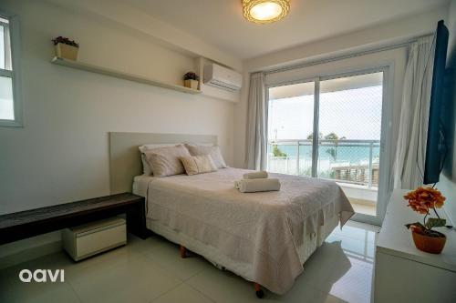 Ένα ή περισσότερα κρεβάτια σε δωμάτιο στο In Mare Bali Resort Cobertura Vista Mar 348 - Qavi