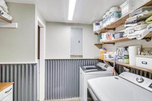 a laundry room with a washer and dryer at 11 Mi to Bozeman Family Home with Movie Room! in Belgrade