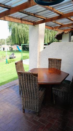 Zahrada ubytování Emasimini Cottages
