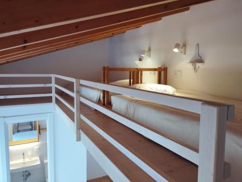a bedroom with two beds in a room at Endless Summer Surf House in Aljezur