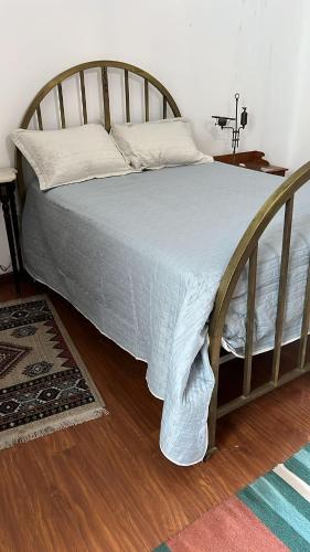 Ένα ή περισσότερα κρεβάτια σε δωμάτιο στο Casa rosa 4