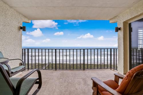 a balcony with a view of the ocean at Amelia Island View Condo in Fernandina Beach