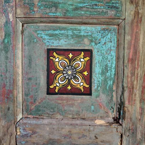 a painting of a door with a flower on it at villa ovita in Talpe