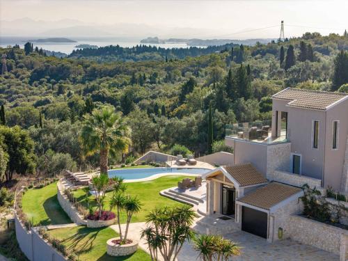 an aerial view of a villa with a swimming pool at Villa Kalithea Corfu in Pouládes