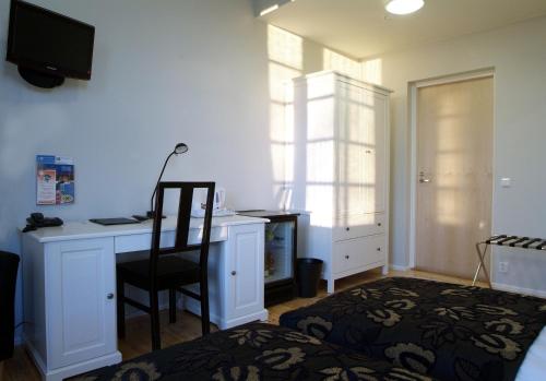Ένα ή περισσότερα κρεβάτια σε δωμάτιο στο Jugend Boutique Hotel