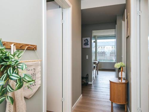 a hallway with a door leading into a room at 4 star holiday home in Fanø in Fanø