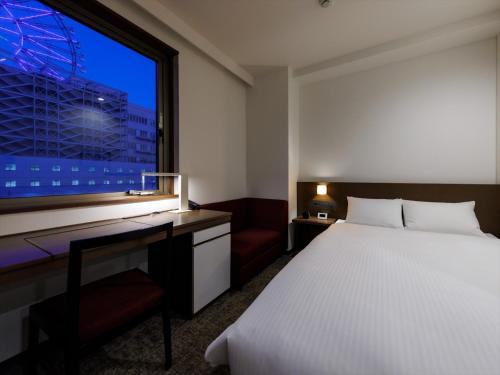 Katil atau katil-katil dalam bilik di JR Kyushu Hotel Kagoshima