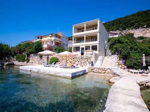 Apartment in Supetarska Draga by Sandy Beach