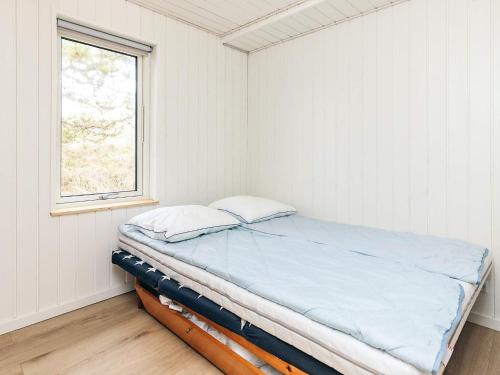 Postel nebo postele na pokoji v ubytování 6 person holiday home in Pandrup