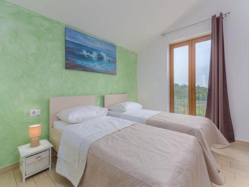 Katil atau katil-katil dalam bilik di Villa in Skitaca with Pool and Sea Views