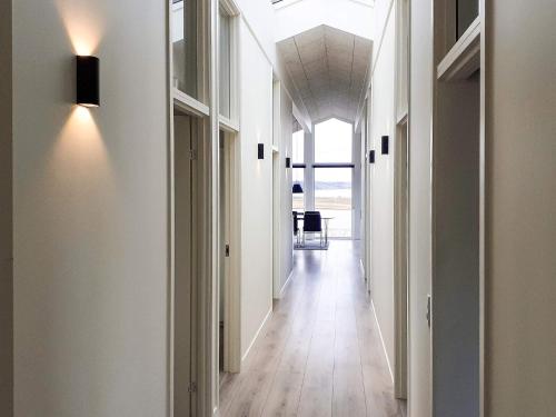 an empty hallway with white walls and a ceiling at 5 star holiday home in Løgstrup in Løgstrup
