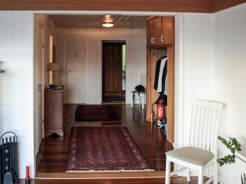 an openoyer with a hallway leading into a house at 7 person holiday home in Molde in Molde