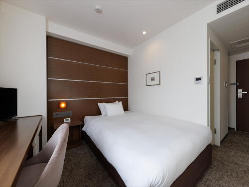 Katil atau katil-katil dalam bilik di JR Kyushu Hotel Kagoshima