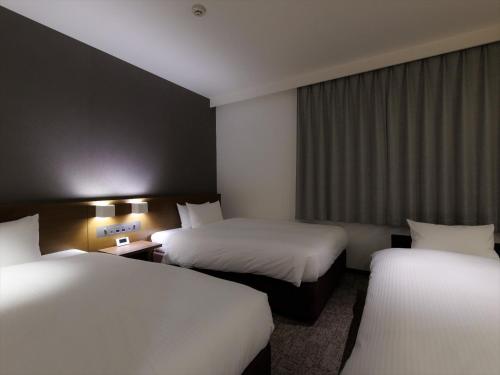 Katil atau katil-katil dalam bilik di JR Kyushu Hotel Kagoshima