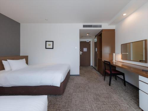 Katil atau katil-katil dalam bilik di JR Kyushu Hotel Kagoshima
