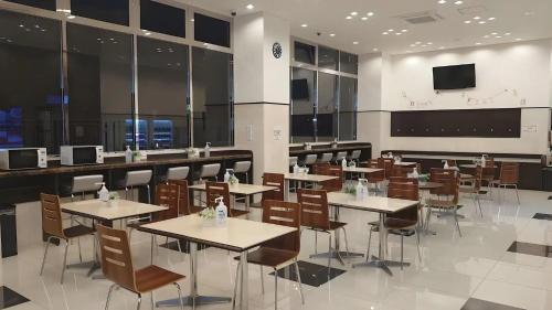 TV a/nebo společenská místnost v ubytování Toyoko Inn Shiki eki Higashi guchi