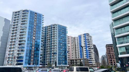 a group of tall buildings in a city at Boho apartment studio in Batumi