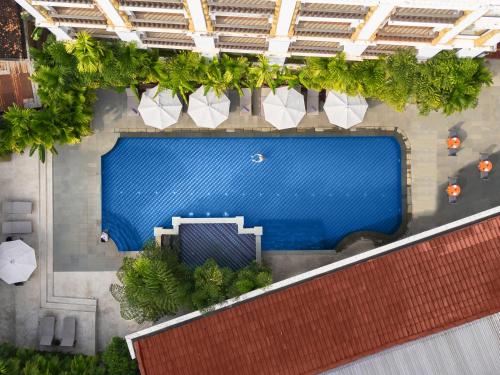 an overhead view of a large blue swimming pool at Angkor Land Urban Boutique in Siem Reap