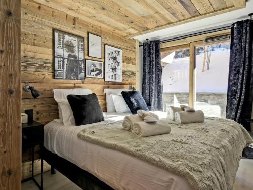 Luxueux Appartement 5 Chambres avec Spa et Terrasse Spacieuse au Rond Point des Pistes, Les Allues - FR-1-613-50