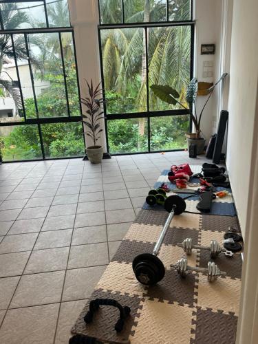 a room with a table with a game on the floor at Hummus Hostel Hikkaduwa in Hikkaduwa