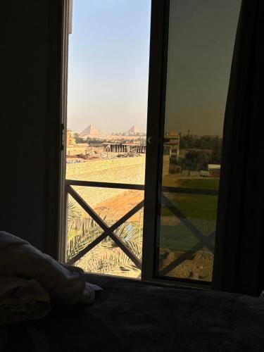 K Boutique Hotel MedSpa-Pyramids & Grand Egyptian Museumにあるバルコニーまたはテラス