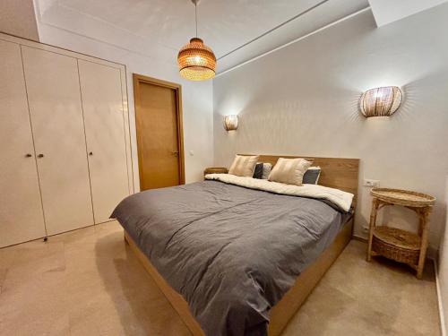 Postel nebo postele na pokoji v ubytování Modern and cozy CFC apartment