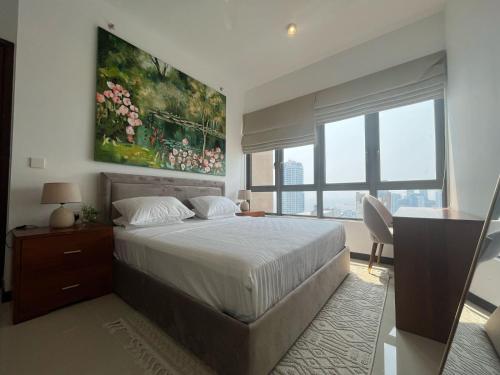 Una cama o camas en una habitación de Trizen OceanView