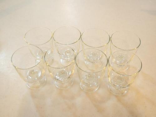 four empty wine glasses sitting on a table at Elle's Garden House in Nasushiobara