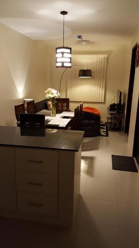 a living room with a couch and a table at The Courtyards Goshen in Baguio