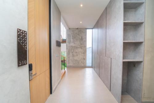 a hallway of a house with a hallway at Keenan Living Luxe Seturan in Seturan