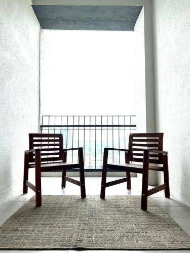 Un balcón o terraza en Cozy Tamarind Suites