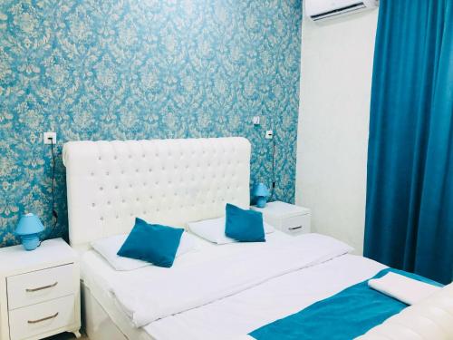 Postel nebo postele na pokoji v ubytování Gegas hotel