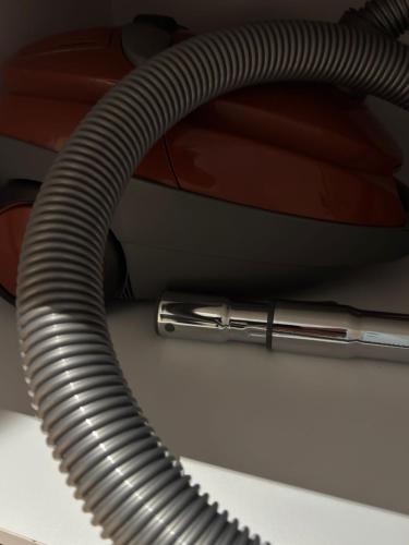 a hose on the side of a car at Moonlight Apart-Hotel Batumi in Batumi