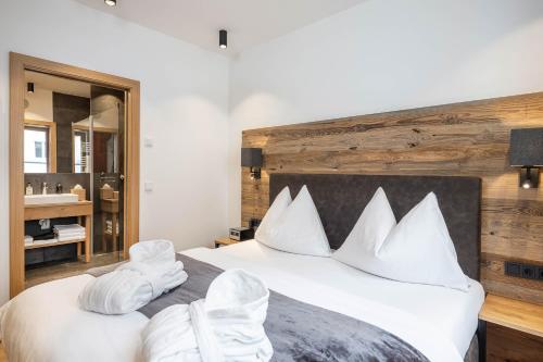 Postel nebo postele na pokoji v ubytování ALPIUM - Luxusappartements