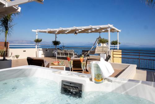 a hot tub on the roof of a house at Unique apartment in Corfu Town