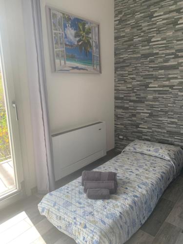 Postel nebo postele na pokoji v ubytování Appartamento di Mara