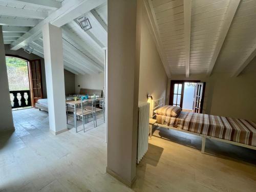 Postel nebo postele na pokoji v ubytování B&B Aria Di Lago