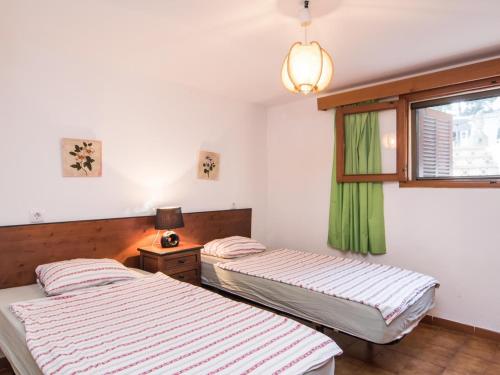 Ένα ή περισσότερα κρεβάτια σε δωμάτιο στο Villa MariaCanyamel By North Properties Mallorca