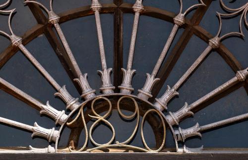 a close up of a metal ceiling with scissors at Sant Pere del Bosc Hotel & Spa - Adults Recommended in Lloret de Mar