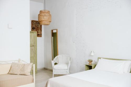 Postel nebo postele na pokoji v ubytování OttoH Charm Stay