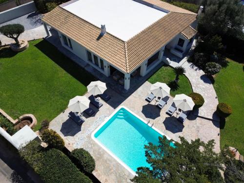 Πισίνα στο ή κοντά στο Sounio Poseidon Villa