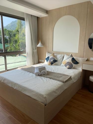 Posteľ alebo postele v izbe v ubytovaní Two-bedrooms apartments with kitchen