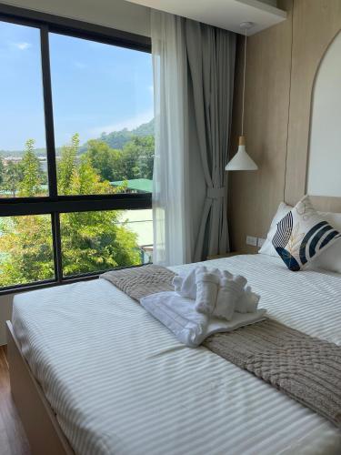 Posteľ alebo postele v izbe v ubytovaní Two-bedrooms apartments with kitchen